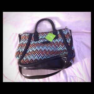 Vera Bradley trimmed trapeze satchel